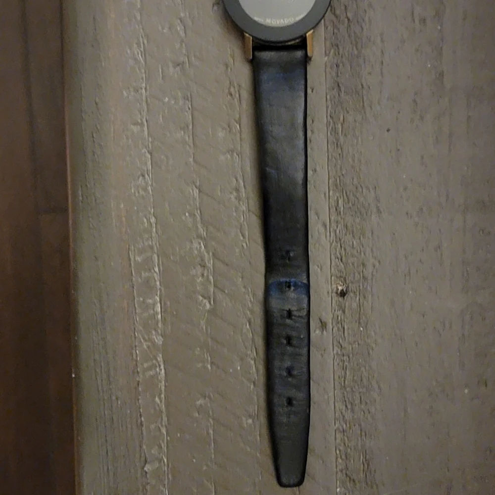 Movado Black and Gold Wearable Watch - Picture 3 of 10